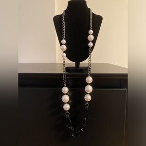 Joan Rivers long black and pearly white necklace with chain and pearly beads